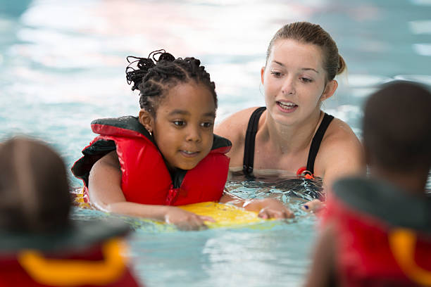 Stamford seasonal positions: image of swim instructor in pool